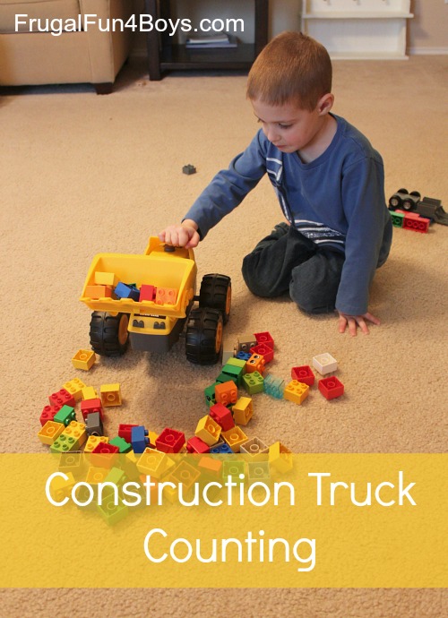 Exploring greater than and less than with construction trucks and blocks