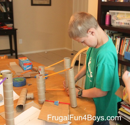Building with cardboard rolls and straws