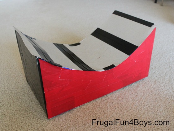 Turn a cardboard box into a jump for Hot Wheels cars!