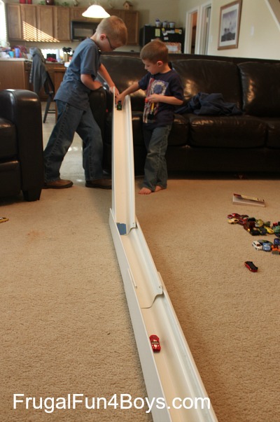 Hot Wheels Car Races with Rain Gutter Track