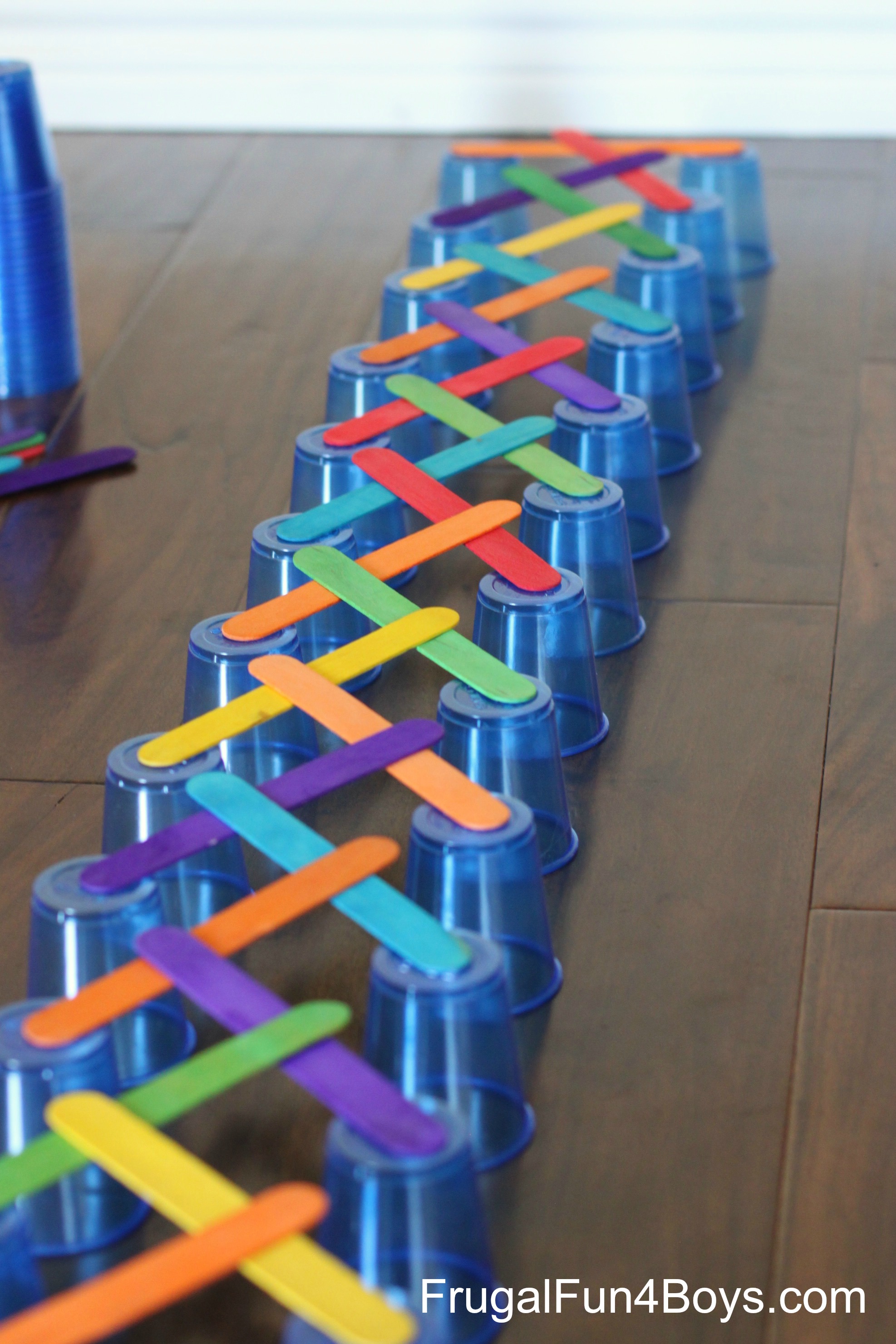 4 Engineering Challenges for Kids - with Cups, Craft Sticks, and Cubes
