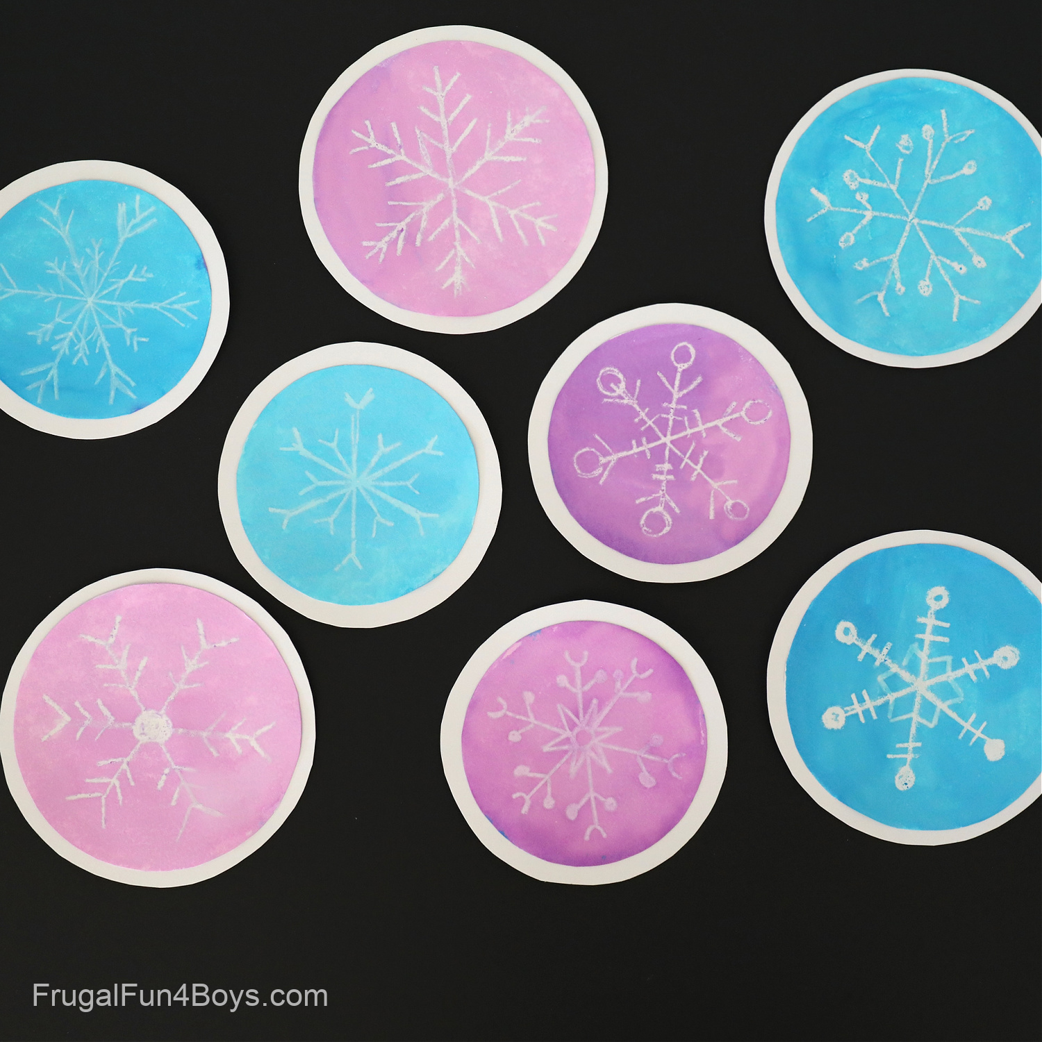 Watercolor and white crayon snowflakes - winter art project